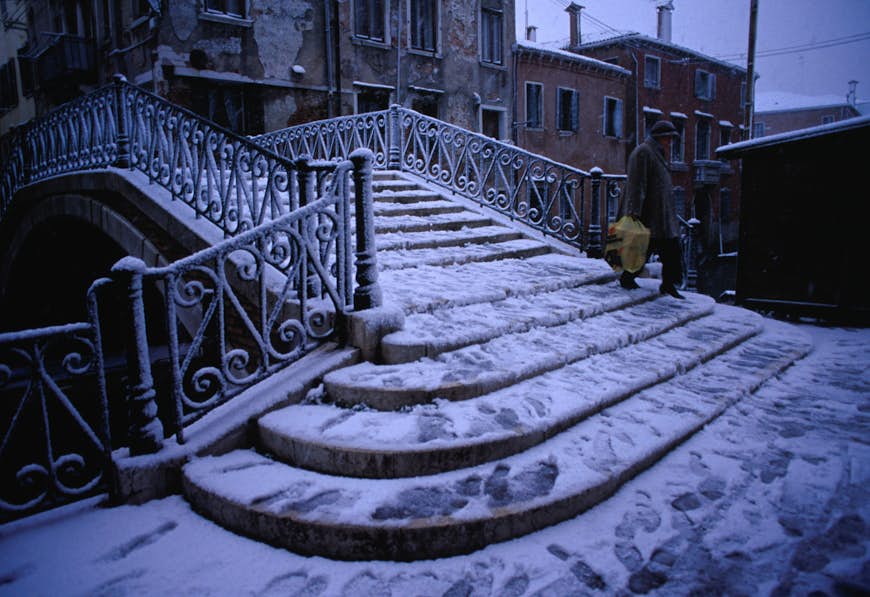 Snow covers Fondamenta della Sensa, the bridge that leads to the historic Jewish quarter.