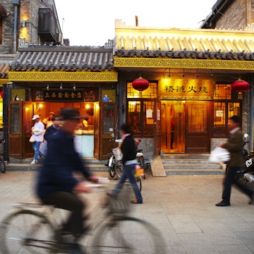 Imperial shopfronts in traditional hutong district.