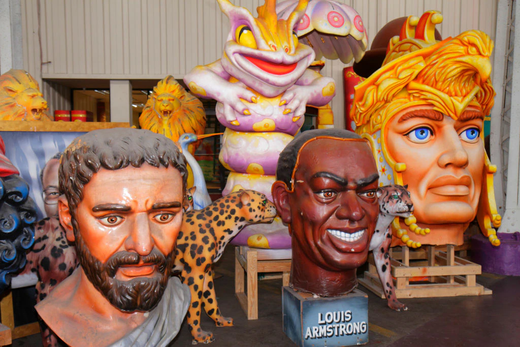 Giant head statues at Mardi Gras World.