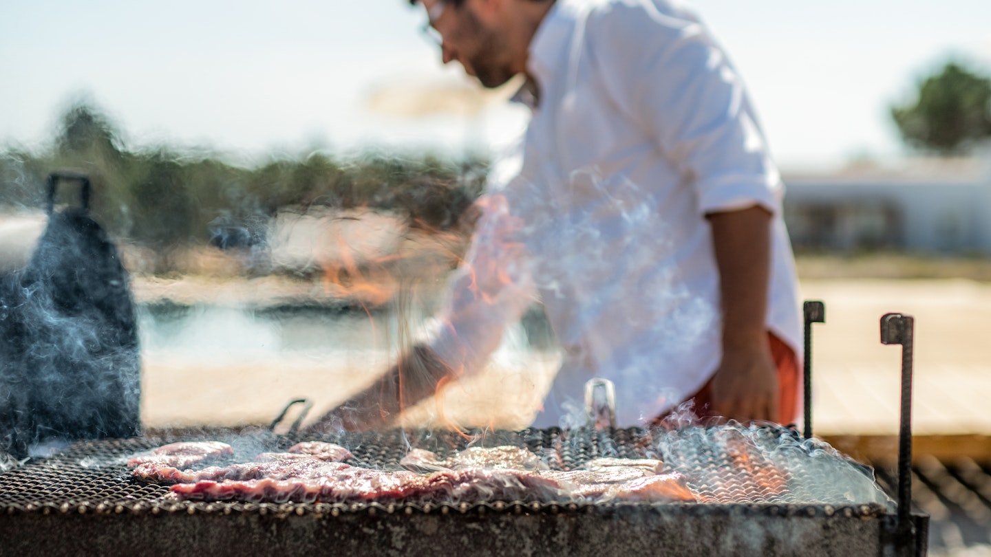 Alentejo's famous porco preto on the grill at Caveiral.