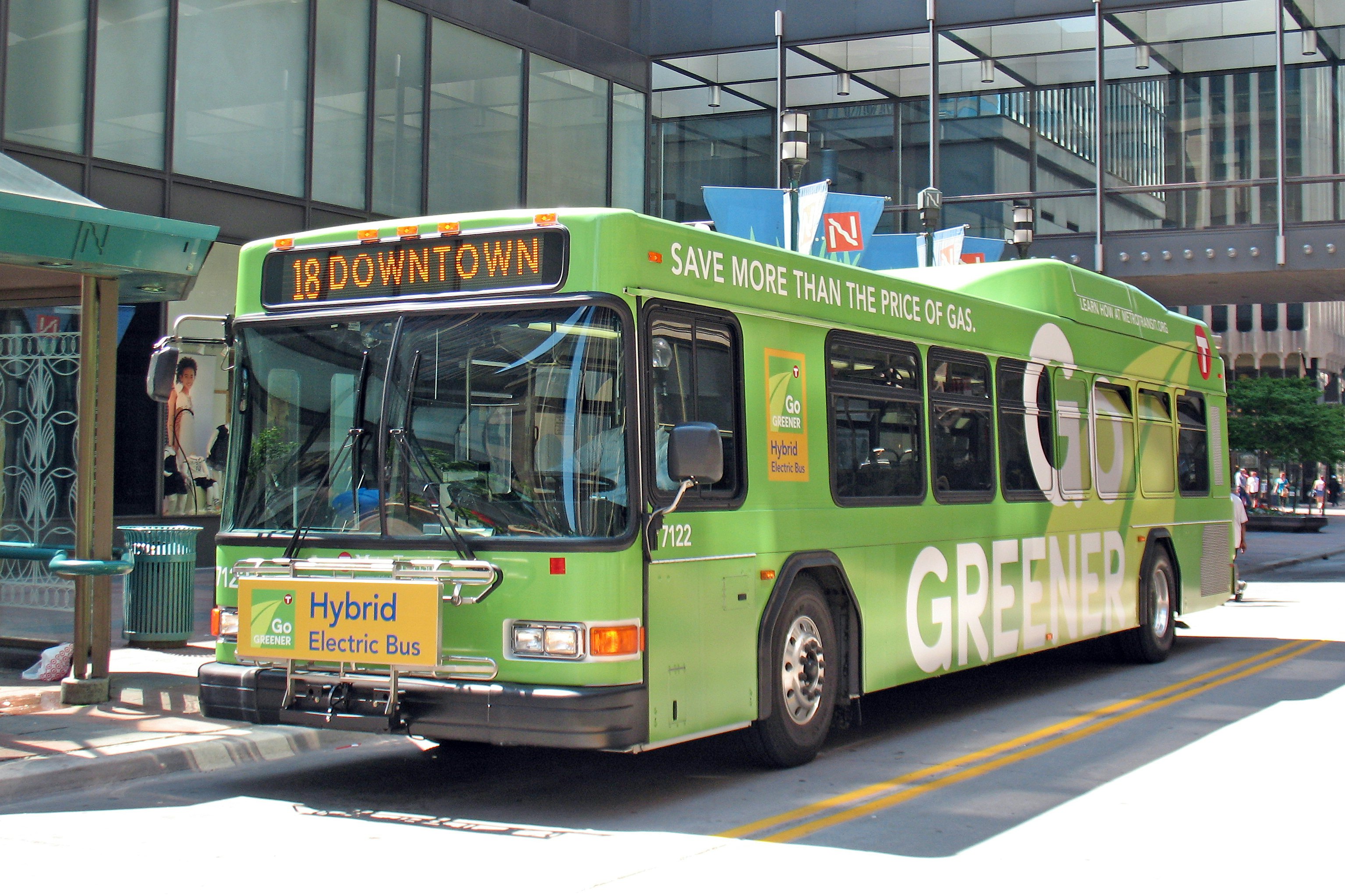 A green hybrid electric Bus in Minneapolis bus