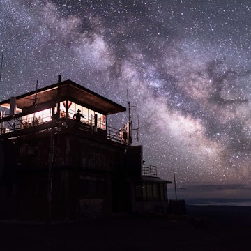 Washburn Fire Lookout under the Milky Way Yellowstone National Park.