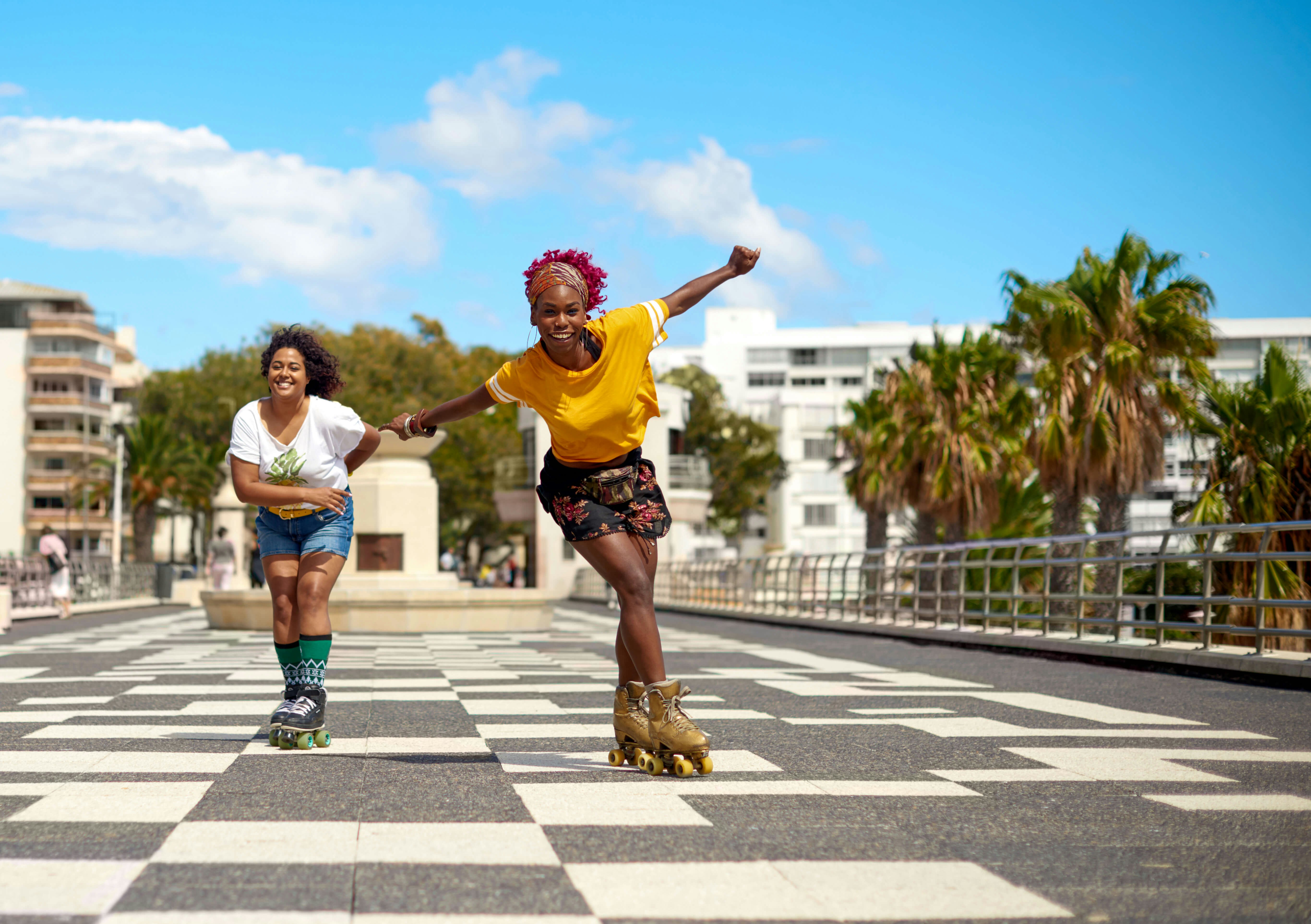 Women roller skating through Cape Town, South Africa