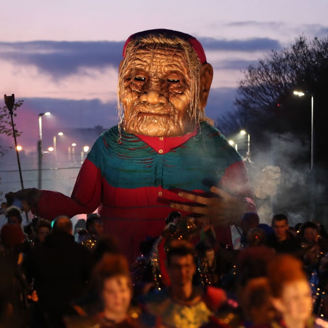 Crowds watch the Macnas Halloween Parade making its way through Galway city centre. PA Photo. Picture date: Sunday October 27, 2019. The parade has been themed with the title Danse Macabre. See PA story SOCIAL Halloween. Photo credit should read: Niall Carson/PA Wire (Photo by Niall Carson/PA Images via Getty Images)