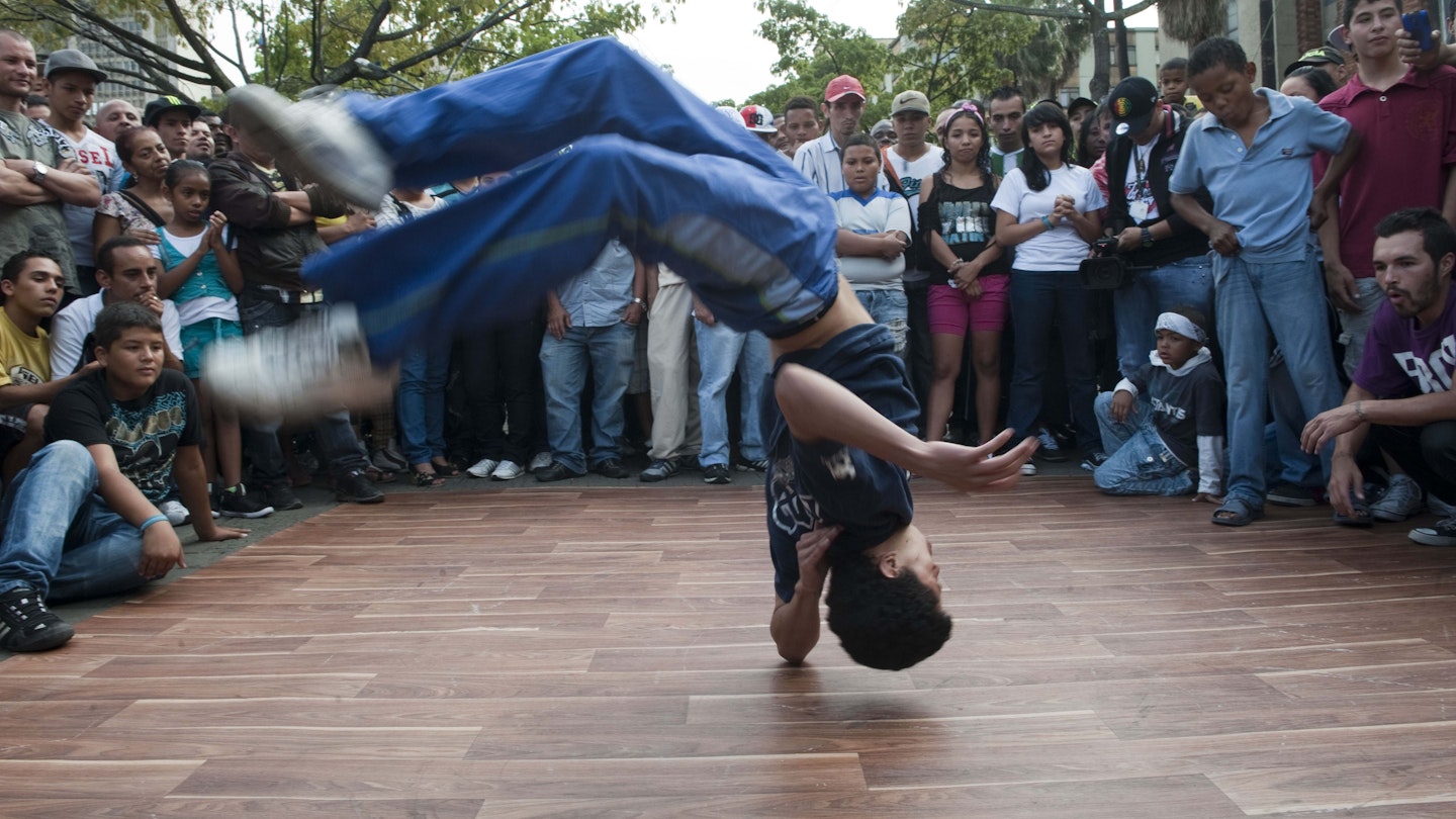 A man performs at Botero park during the Hip Hop Festival "Your voice counts", in Medellin, Antioquia department, Colombia on September 22, 2012. The festival, sponsored by the United Nations Office on Drugs and Crime, is the result of a competition of cultural and musical groups that use hip hop to spread positive messages.  AFP PHOTO/Raul ARBOLEDA        (Photo credit should read RAUL ARBOLEDA/AFP/GettyImages)