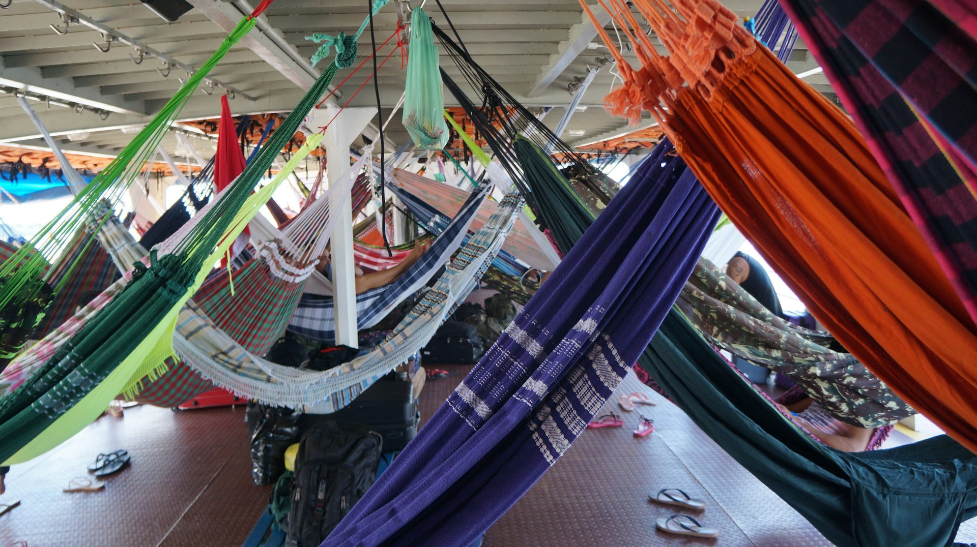 Colorful hammocks strung up on a ferry boat from Macapa to Belem