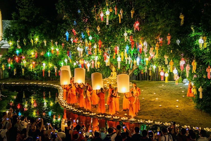 CHIANG MAI THAILAND-NOVEMBER 7 : Loy Krathong festival in Chiangmai.Traditional monk lights floating balloon made of paper annually at Wat Phan Tao temple.On November 7, 2014 in Chiangmai, Thailand.