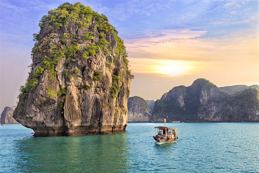 shutterstockRF_257155450.jpg Dreamy sunset among the rocks of Halong Bay, Vietnam
