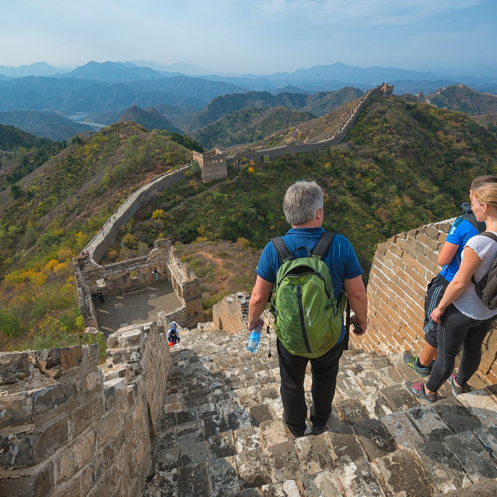 BEIJING - OCT 18: people hike the Great Wall on October 18, 2015 in Beijing, China. The Ming dynasty walls measure 8,850 km in length, from China's East coast till the Gobi desert in the West.