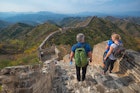 BEIJING - OCT 18: people hike the Great Wall on October 18, 2015 in Beijing, China. The Ming dynasty walls measure 8,850 km in length, from China's East coast till the Gobi desert in the West.