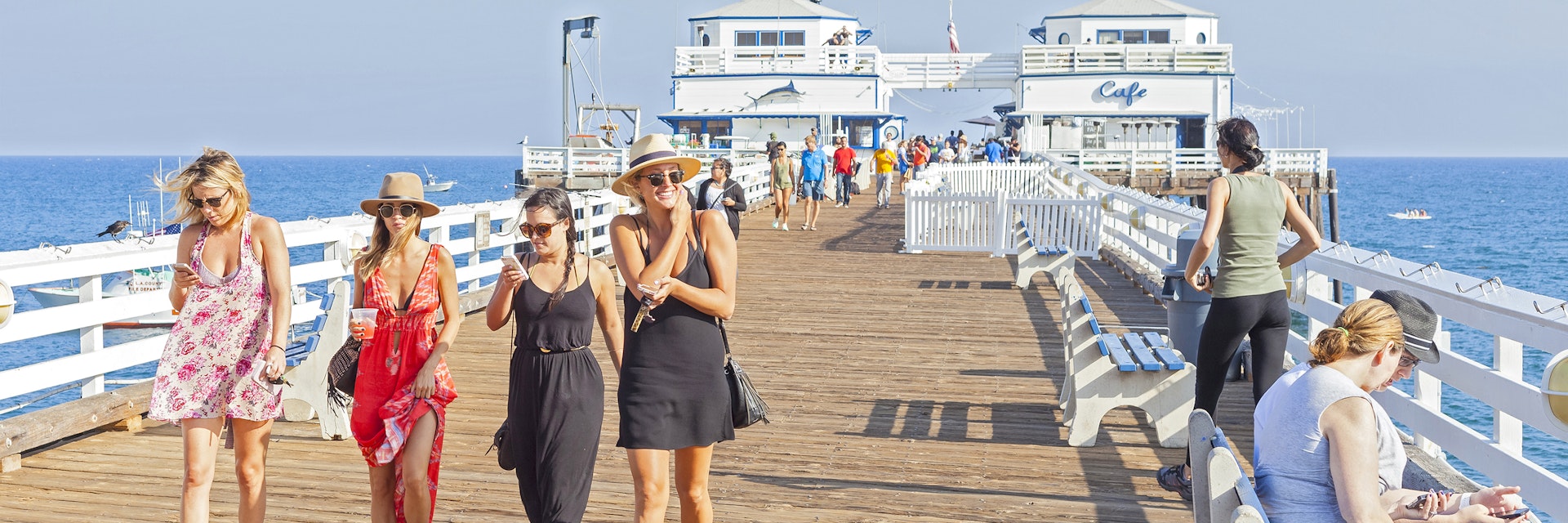 People walking on the Malibu Pier.