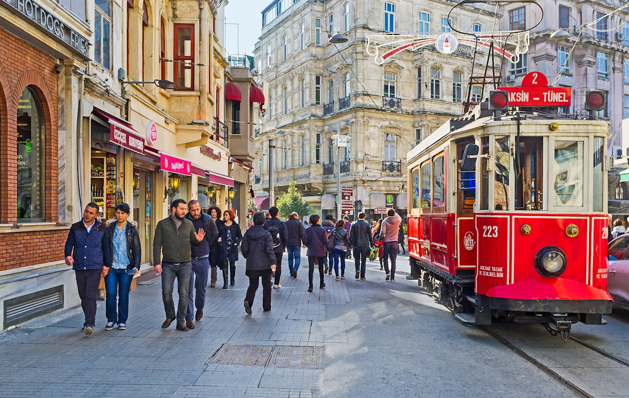 ISTANBUL, TURKEY - JANUARY 22, 2015: The old red tram in Istiklal Caddesi (Independence Avenue), the central shopping street of the city, on January 22 in Istanbul.
