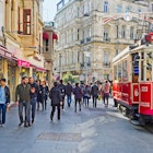 ISTANBUL, TURKEY - JANUARY 22, 2015: The old red tram in Istiklal Caddesi (Independence Avenue), the central shopping street of the city, on January 22 in Istanbul.
