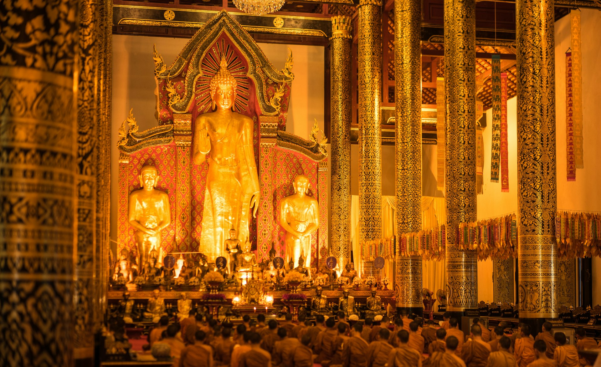 photo of Golden buddha statue in Wat Chedi Luang Worawihan Temple, Chiang Mai