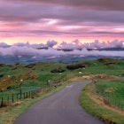 Wales, Powys, near Machynlleth, storm cloud sunset, winding road