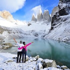 Couple admiring scenery at Parque Nacional Torres del Paine