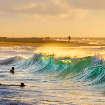 Enjoying the waves at Sandy Beach Park.