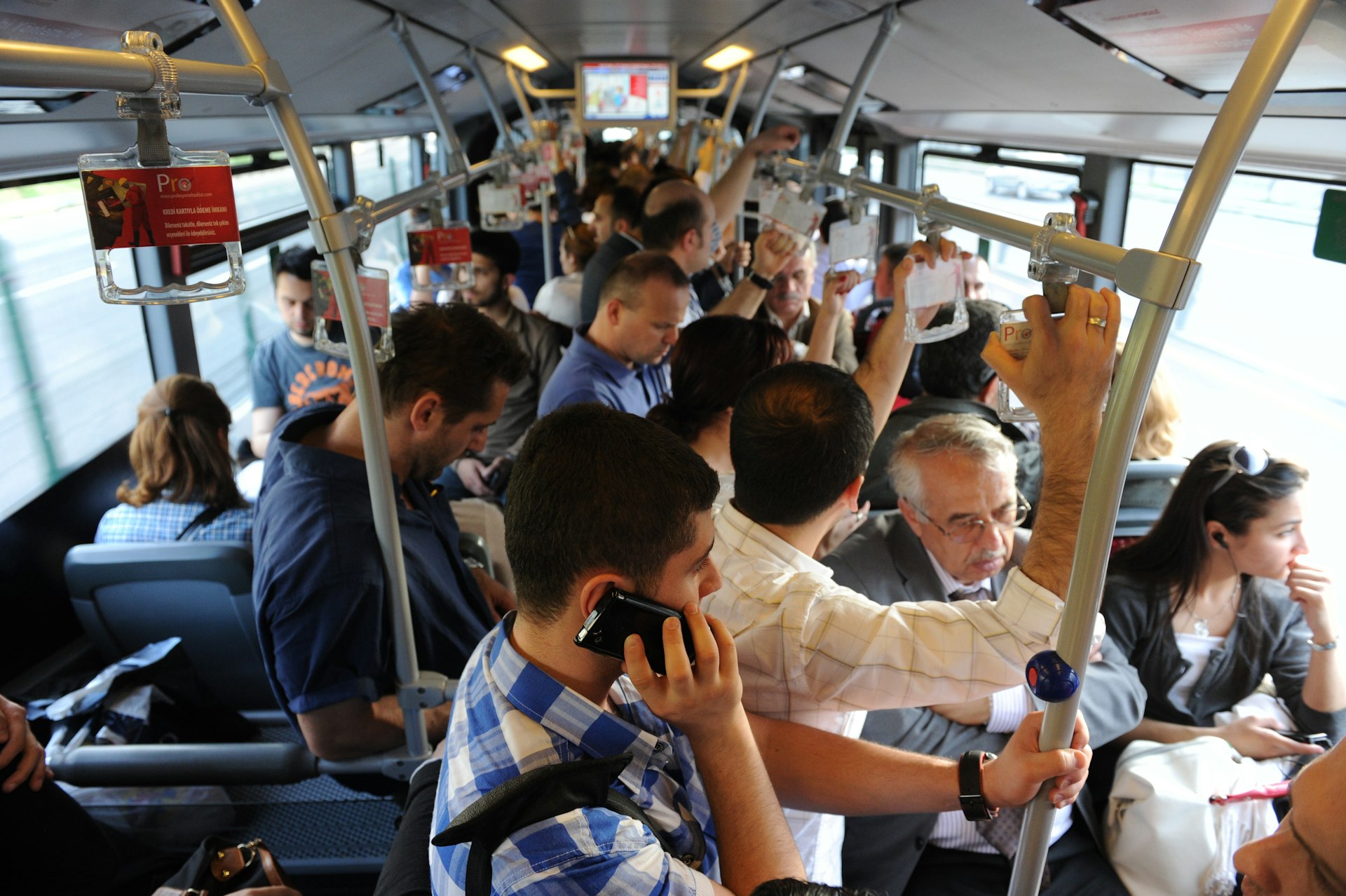 Passengers on the Metrobus in Istanbul, Turkey