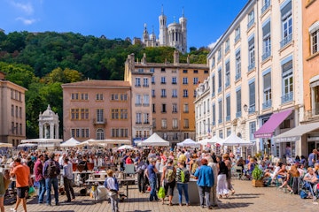A busy arts and ceramics market in the Place Saint-Jean in Lyon