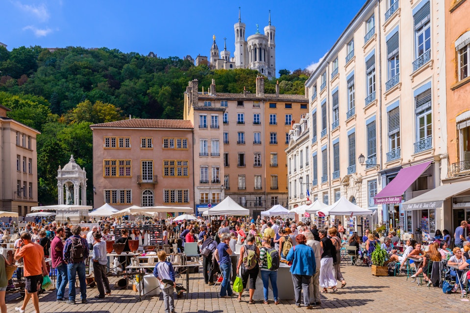 A busy arts and ceramics market in the Place Saint-Jean in Lyon