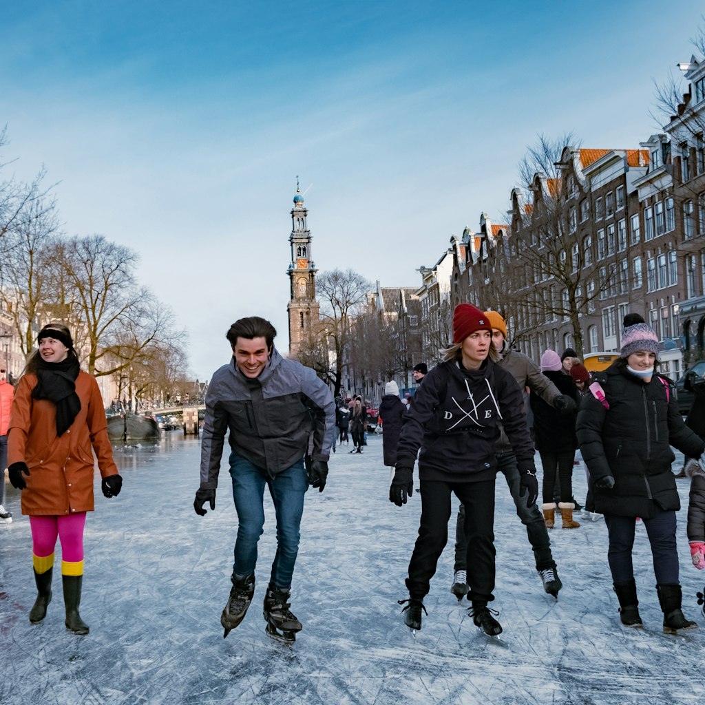 Amsterdam Netherlands February 2021,Ice skating on the canals in Amsterdam the Netherlands in winter, frozen canals in Amsterdam during winter