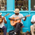 Havana, Cuba - March 24, 2017: Elderly street musicians playing traditional cuban music on the street in old Havana