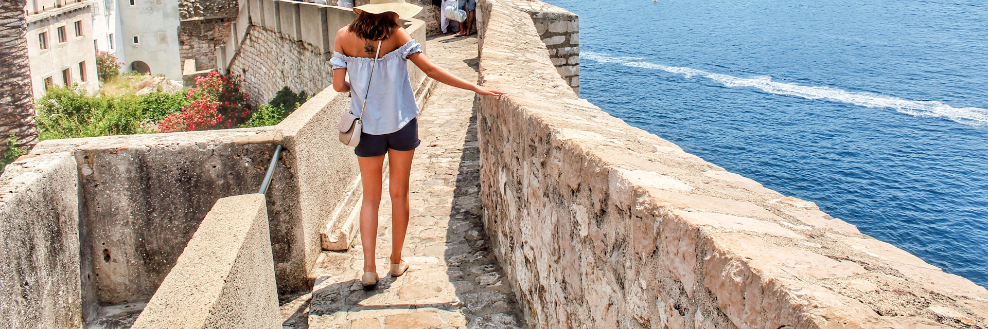 A woman walking in Croatia.