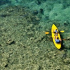 Father and son kayaking at Fort Hamilton, Bermuda.