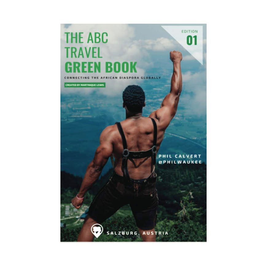 The cover of The ABC Travel Greenbook: Connecting the African Diaspora Globally, showing a shirtless Black man from the back with his arm raised 