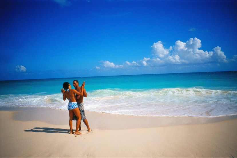 Couple Holding Each Other on a Beach