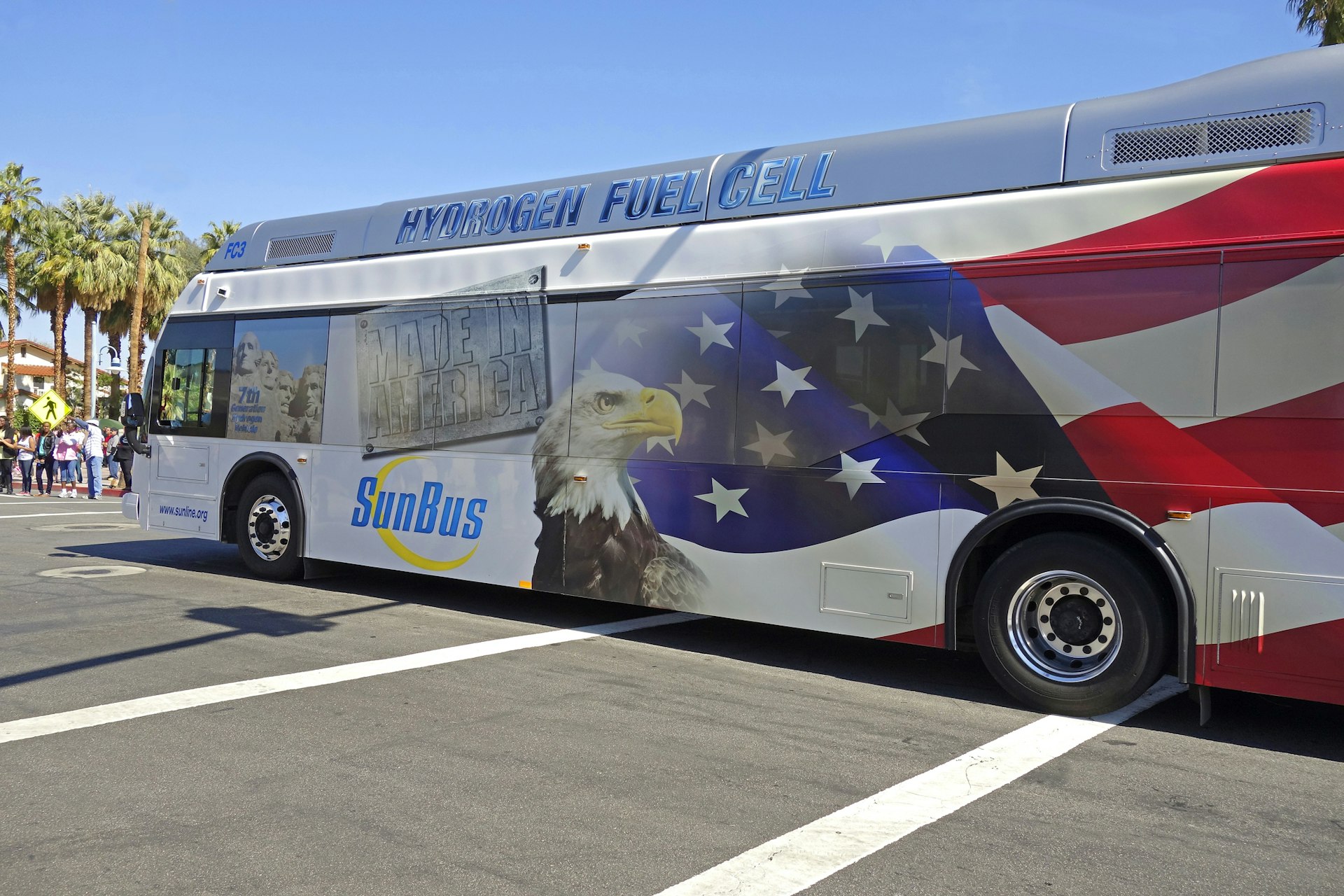 hydrogen fuel cell bus with American flag and eagle on the side