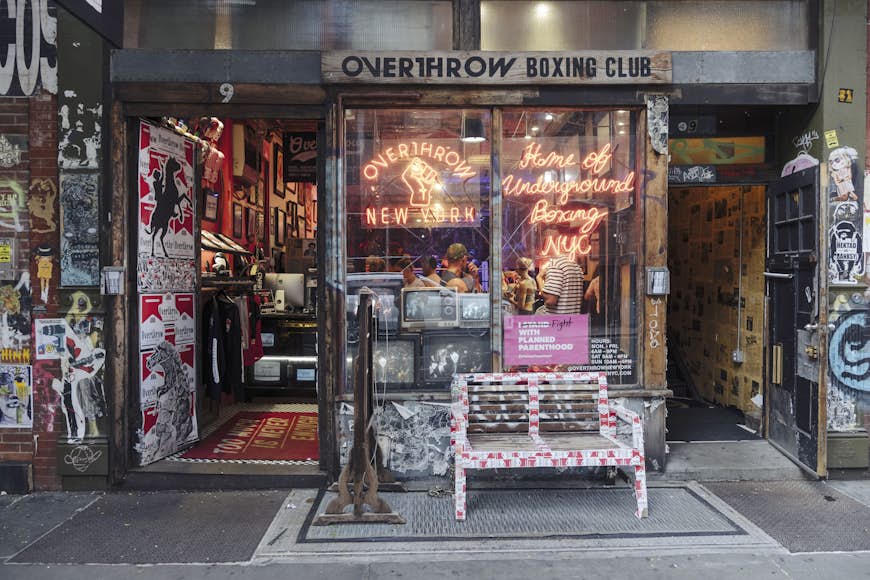 Neon signs out the front of the Overthrow Boxing Club, on Bleeker St in the East Village