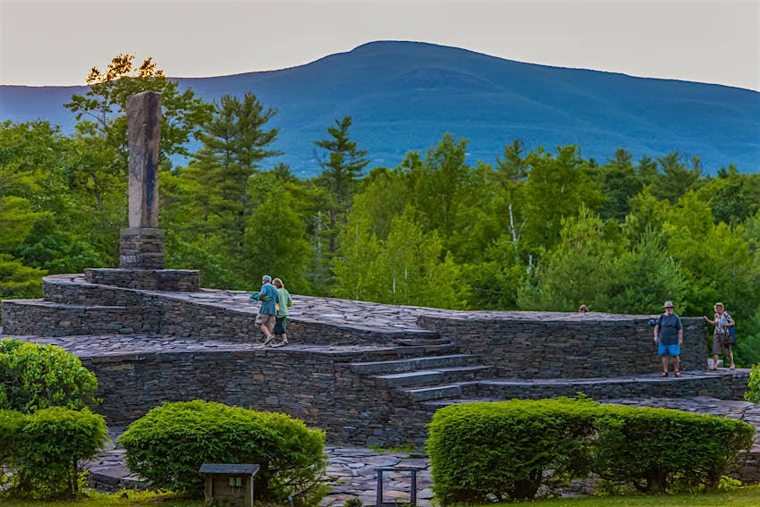 People walk over the sprawling earth sculpture Opus 40 in Saugerties, in the heart of New York's Hudson Valley