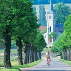 A man cycling in the Burgundy countryside