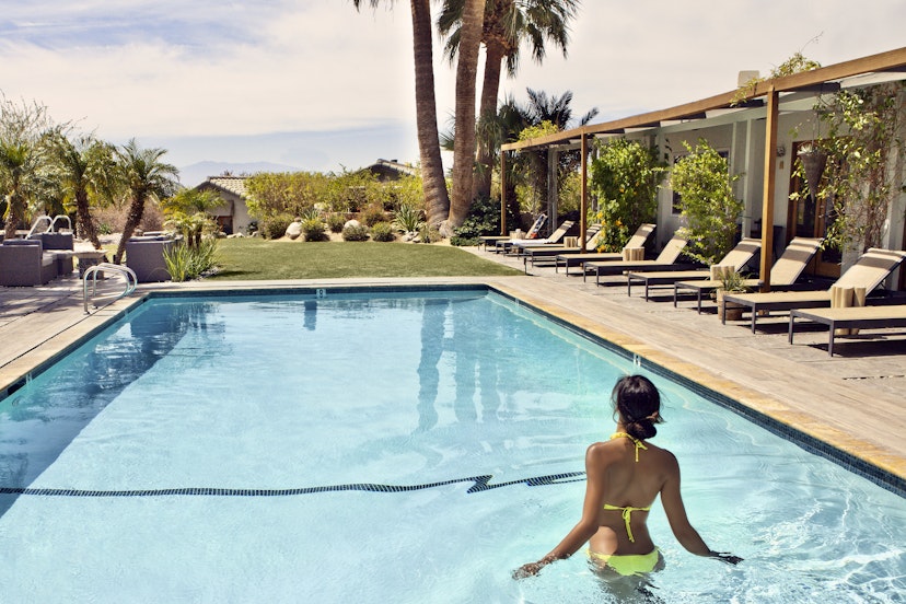 A women standing in a pool at a Palm Springs spa resort