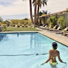 A women standing in a pool at a Palm Springs spa resort