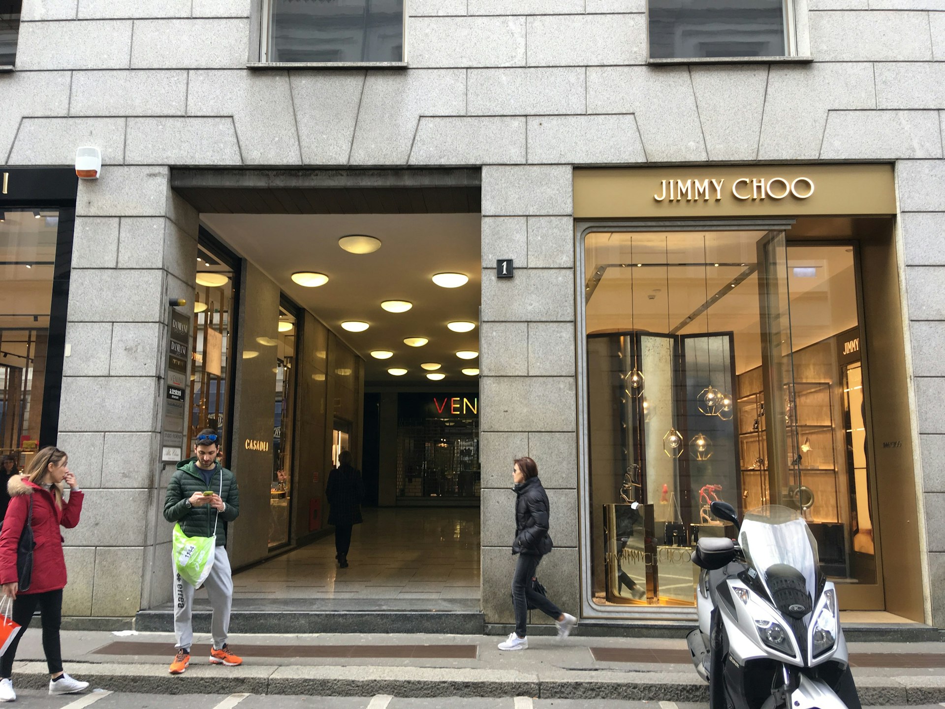 People in front of the Jimmy Choo store in the Quadrilatero del’Oro