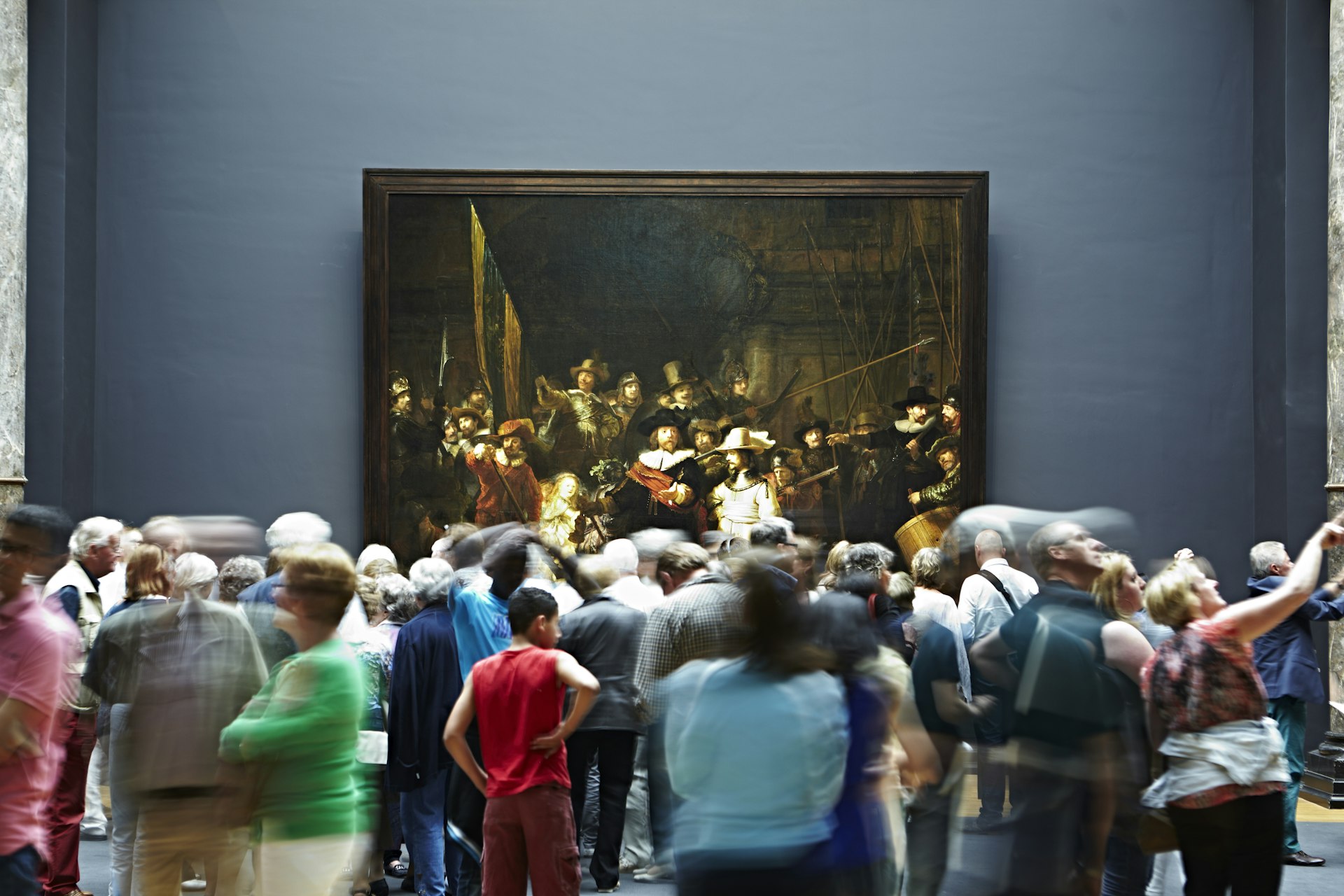 Crowd looking at Rembrandt’s 'The Night Watch' at the Rijksmuseum. 