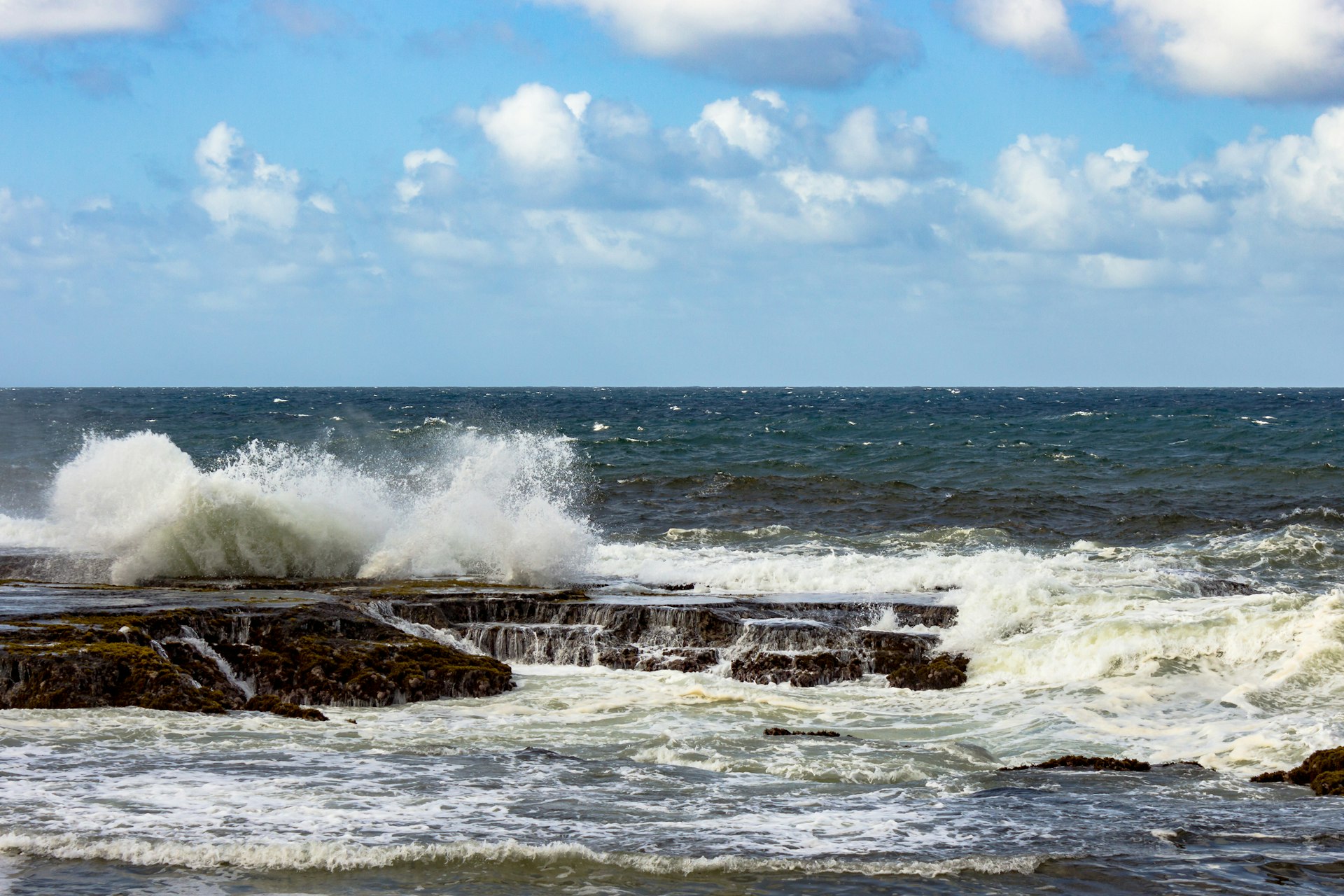 Waves crashing on rocks at Little Bay in St Lucy parish, Barbados