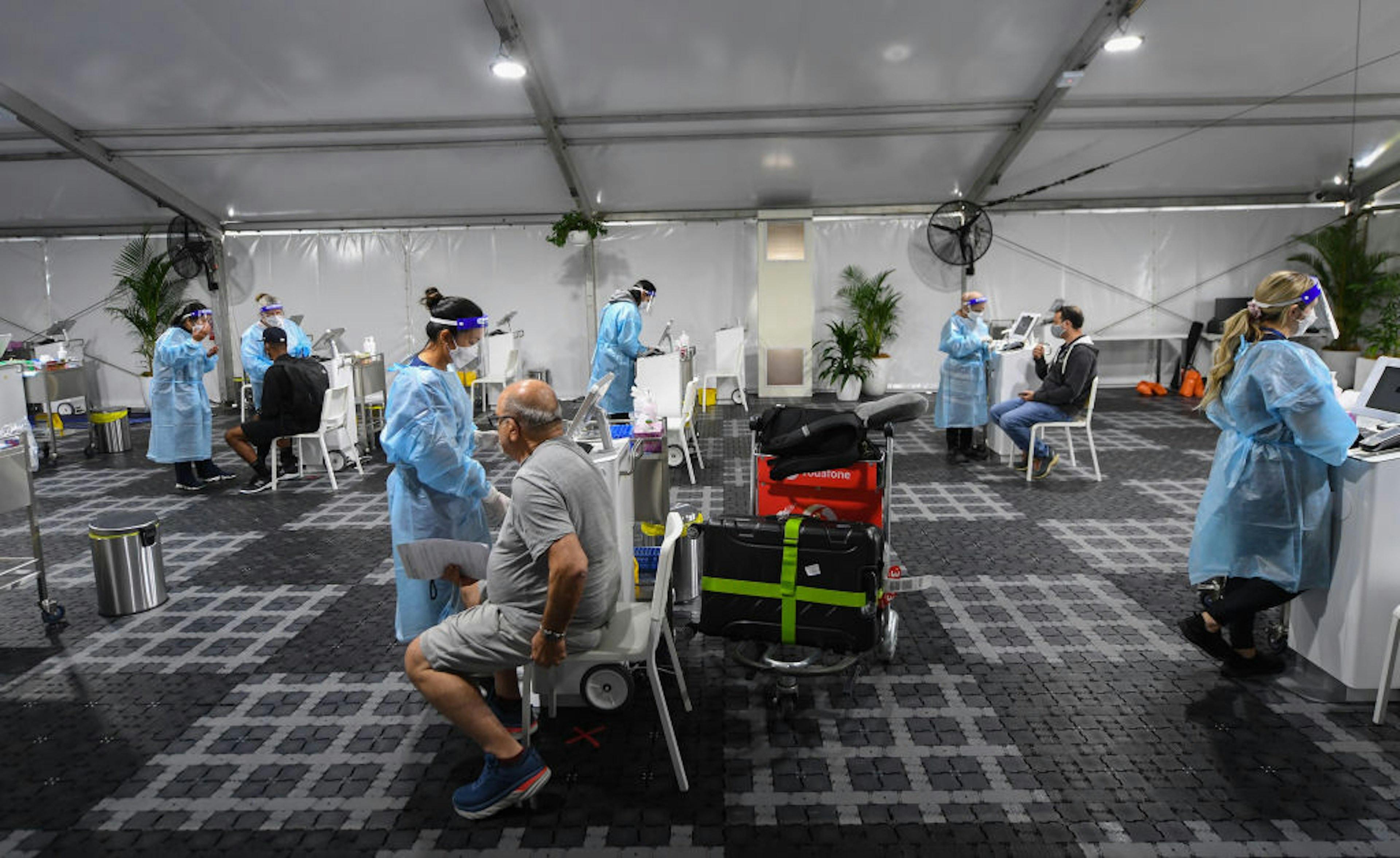 Passengers undergo COVID-19 tests at Sydney International Airport