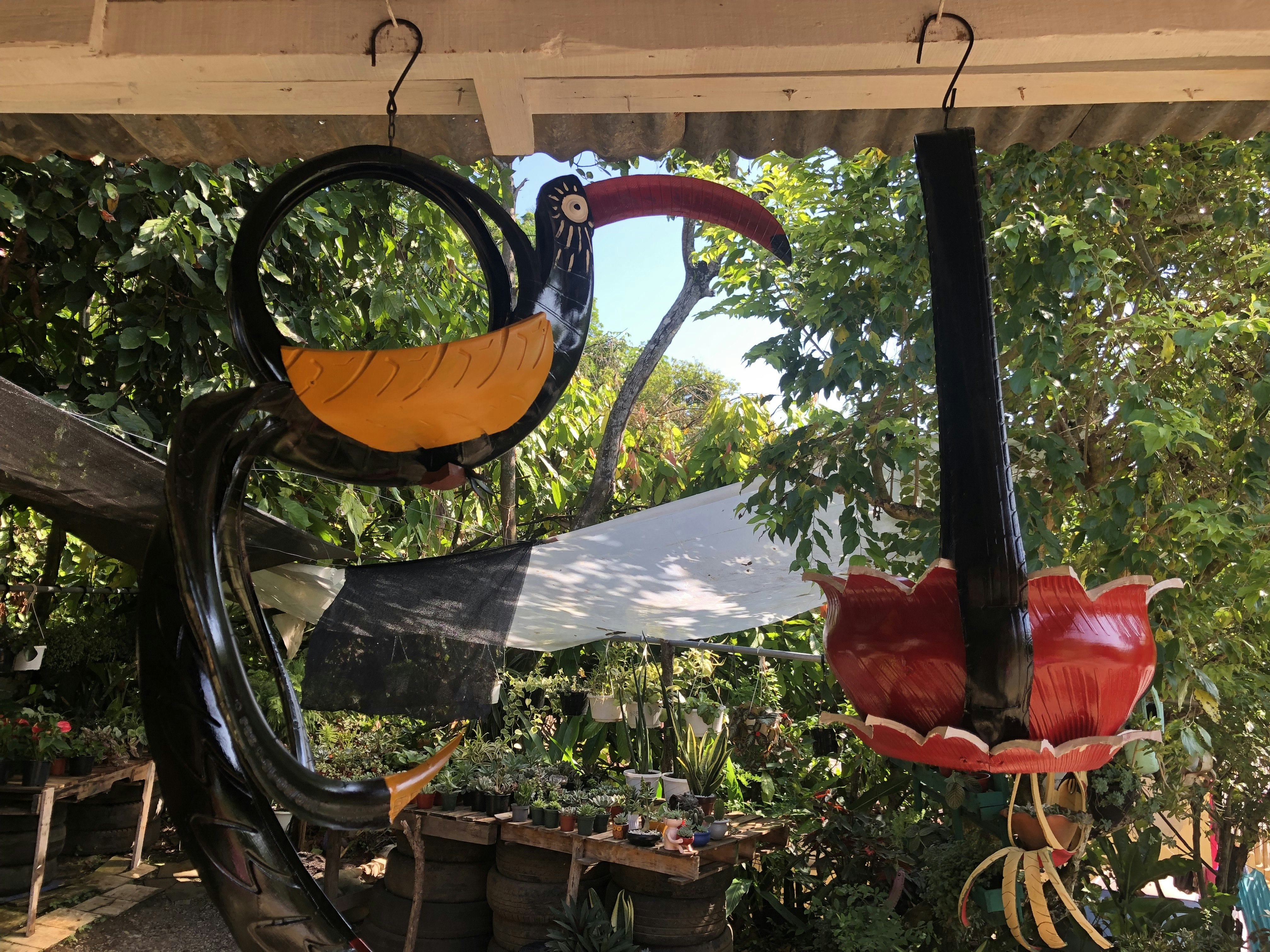 flower baskets made from old tires.JPG