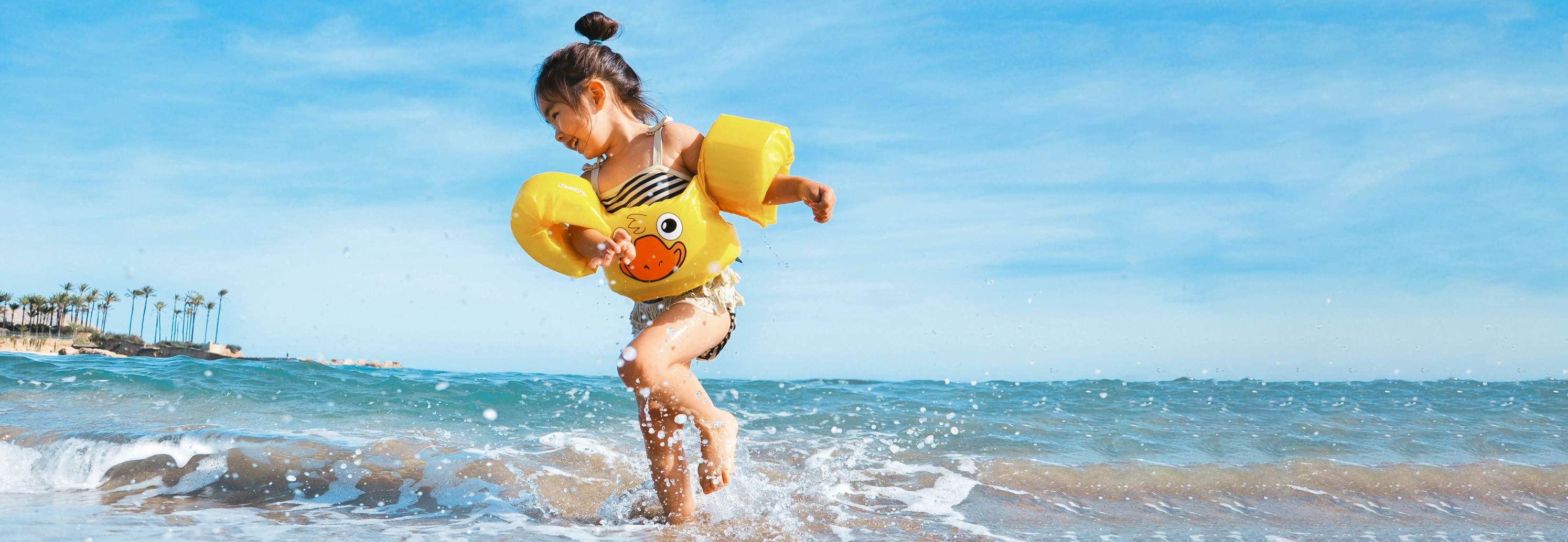 Child playing in warm waters.