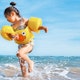 Child playing in warm waters.
