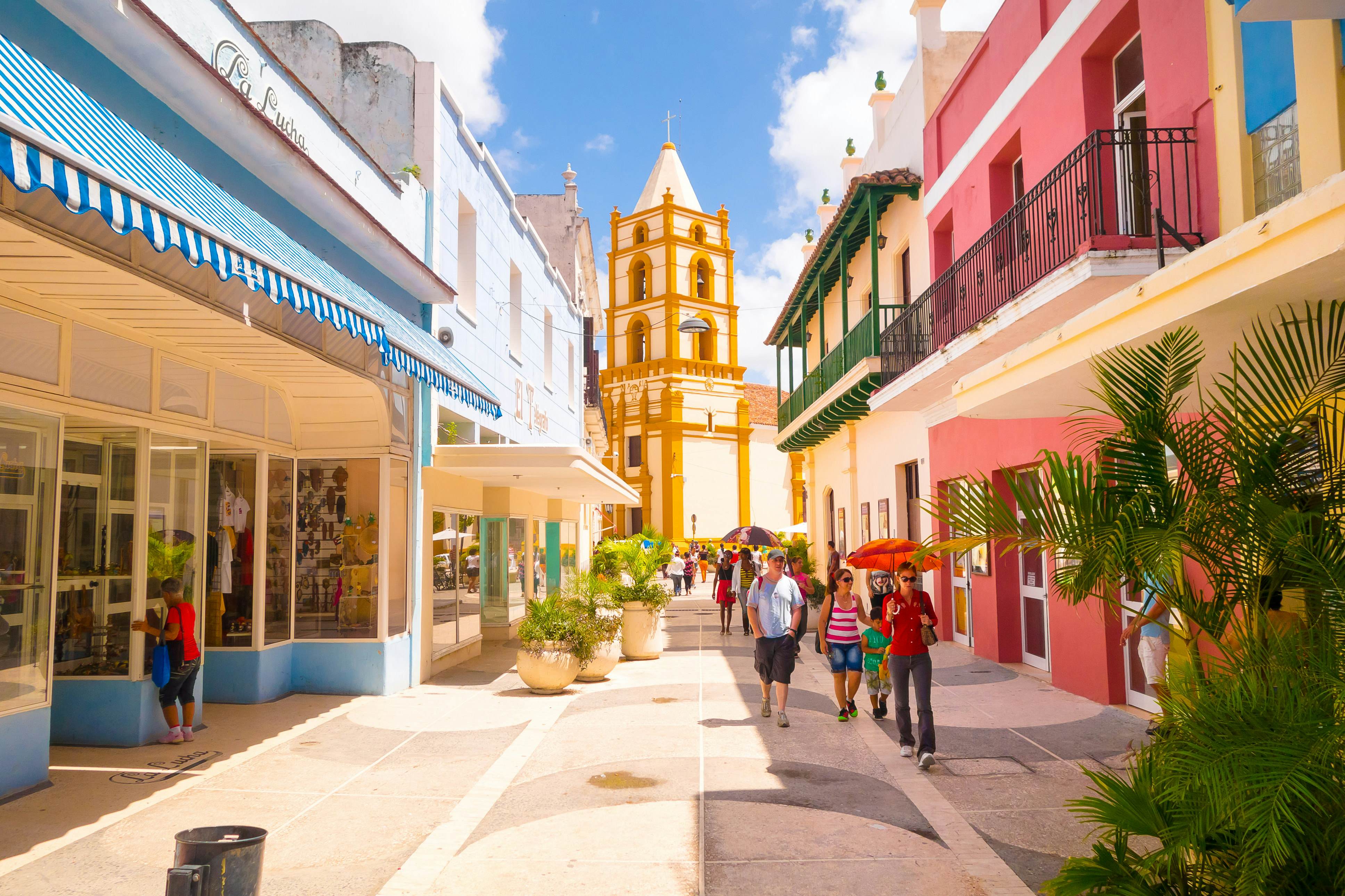 Walking boulevard with colourful stores in Camaguey