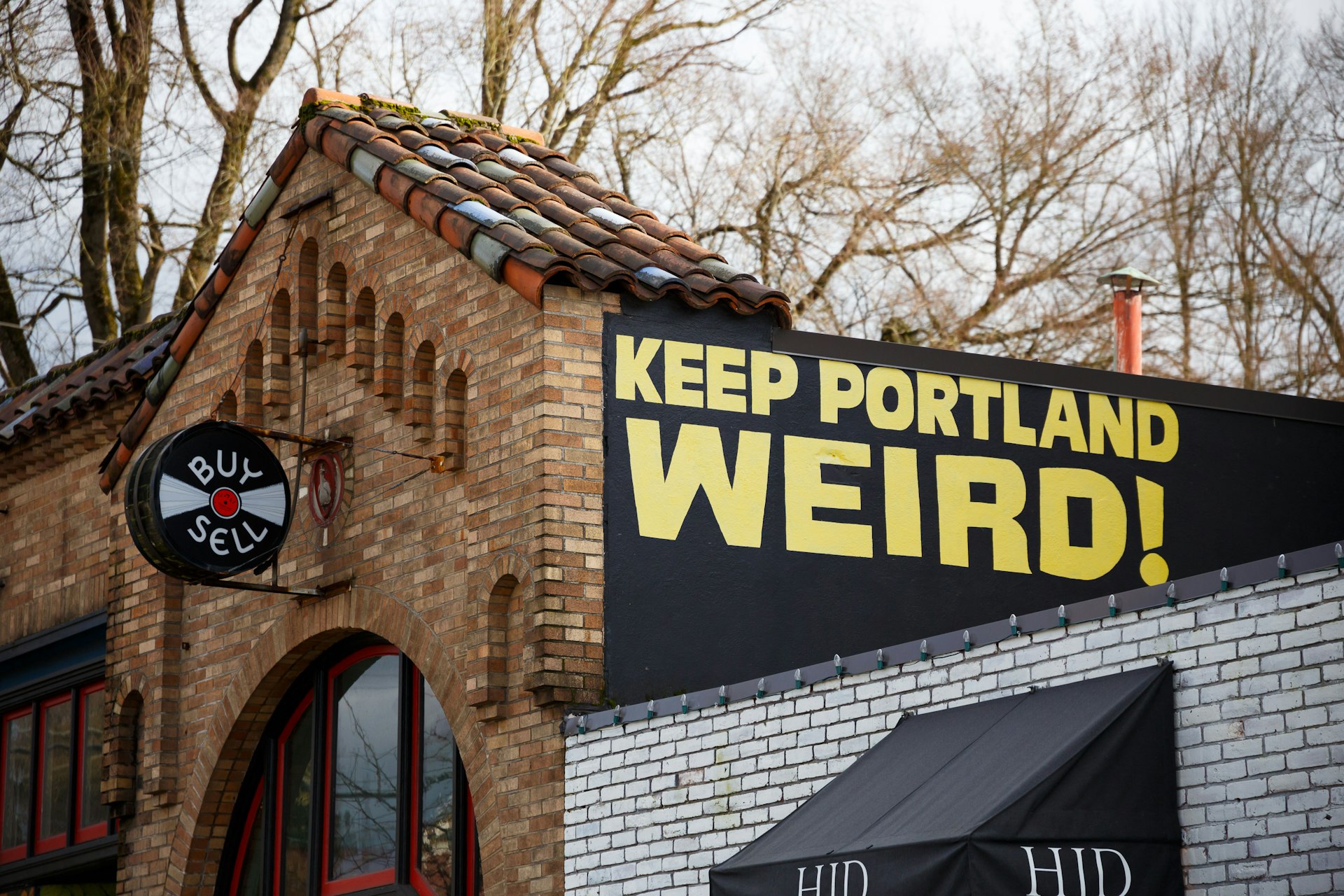 Keep Portland Weird sign at a well known record store in downtown