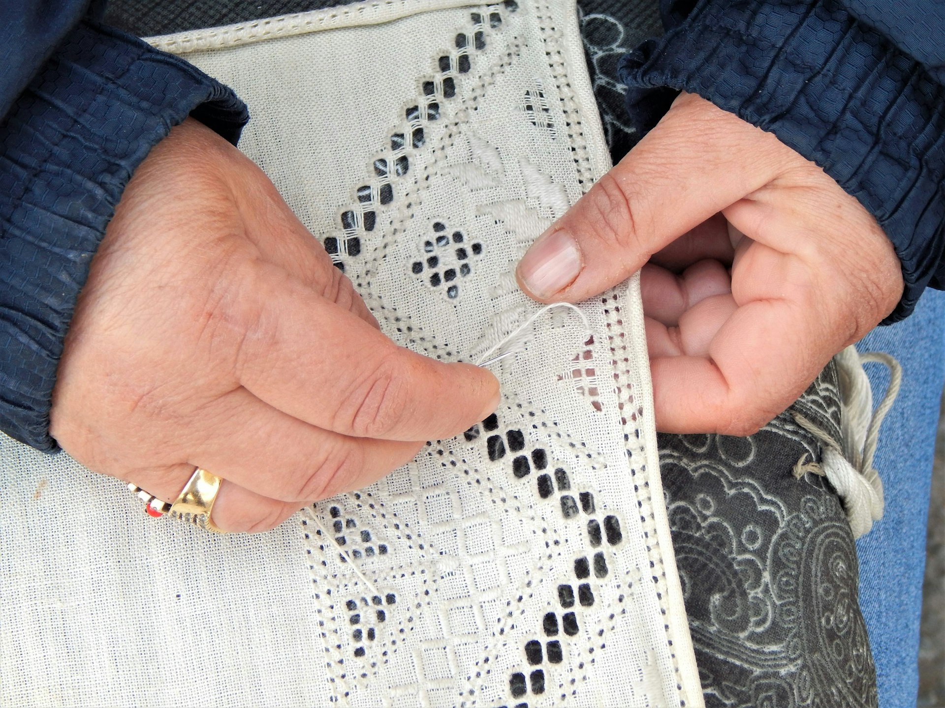Hands of a woman making lace in Pano Lefkara