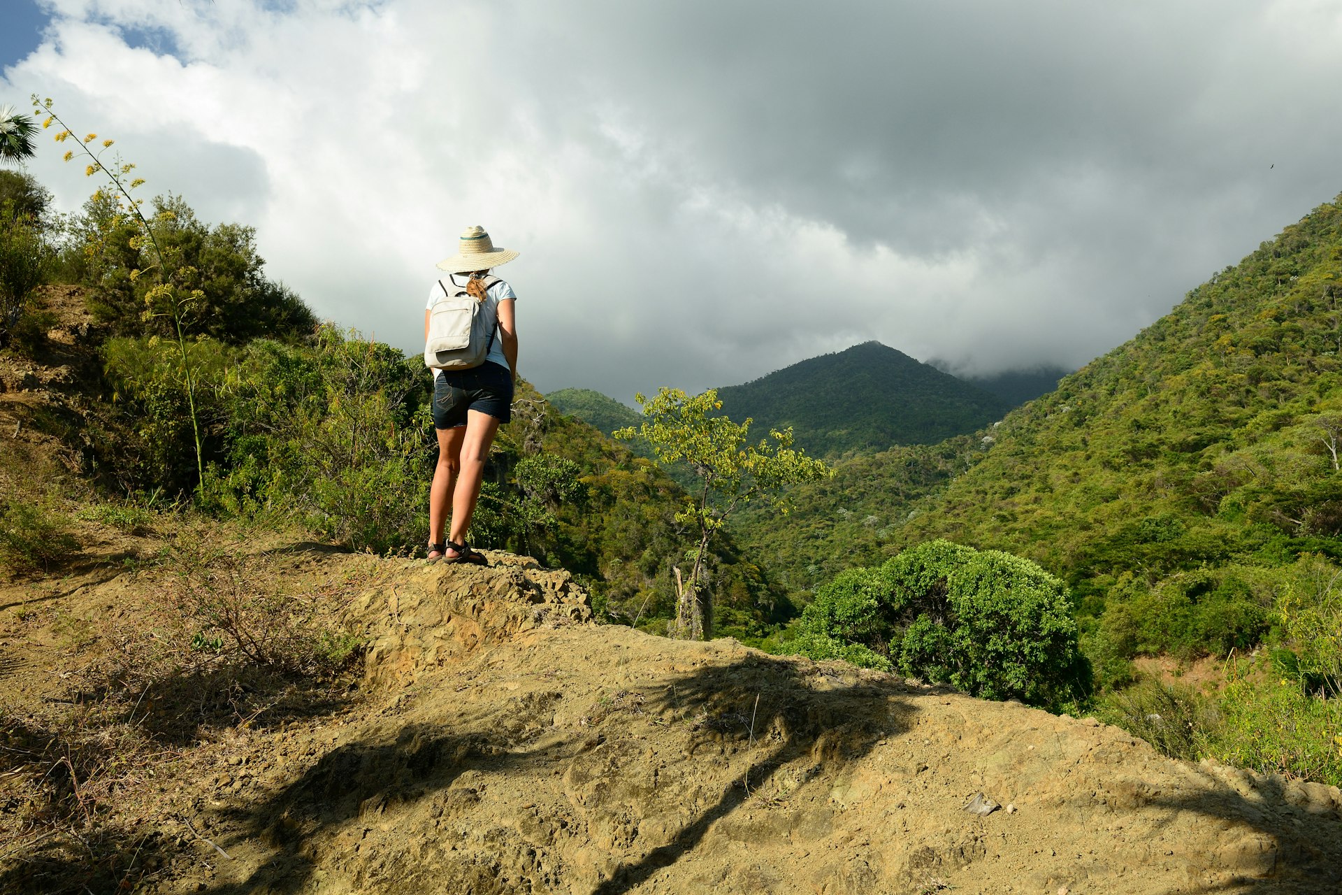 Tourist on a trail to Pico Turquino mountain in Cuba 