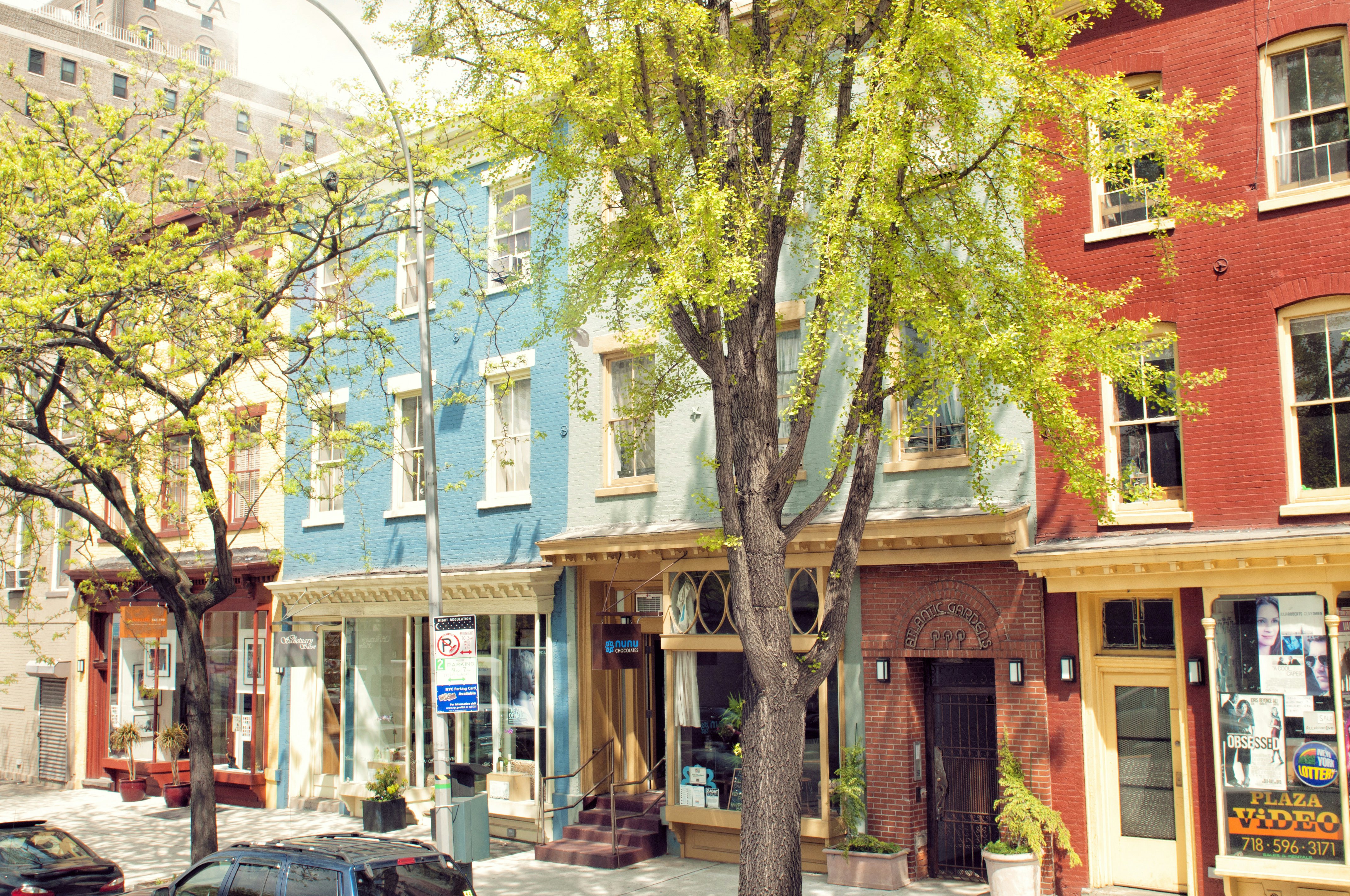 Colorful buildings along Brooklyn's Atlantic Avenue on a sunny day