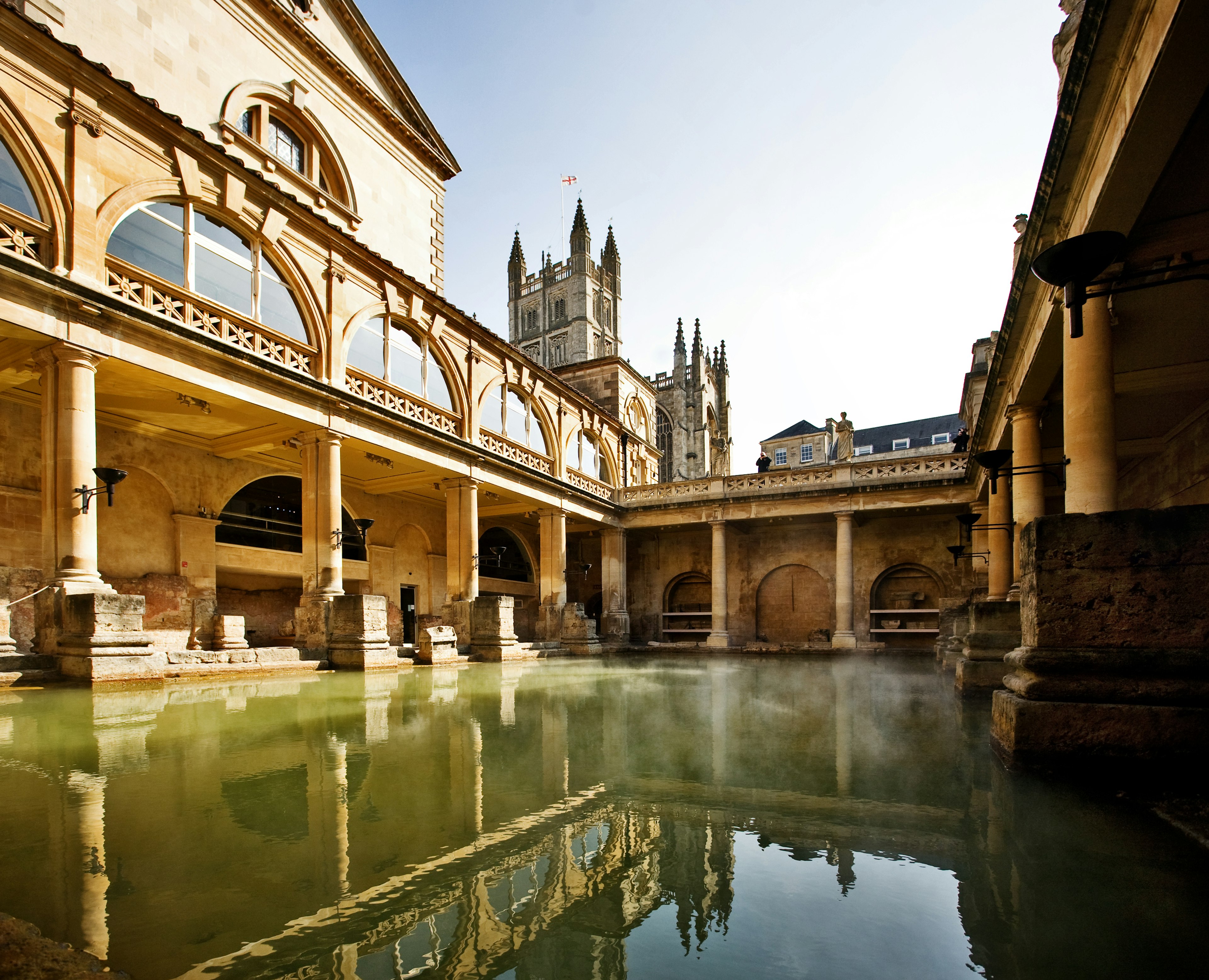 Roman Baths with Bath Abbey reflection in Bath, England