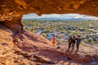 People snap selfies in the mouth of Hole-in-the-Rock, Phoenix, Arizona.